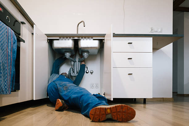 Professional Emergency Plumber technician working in Midway City, CA